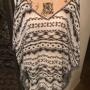 Sheer blouse with poncho sleeves Never worn